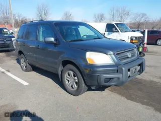 2003 Honda Pilot EX with VIN 2HKYF18503H610799, listed as a IAAI auction lot 41528867 with 323,810 mi miles. Bid and sale history available at carsss.com. Image 1.
