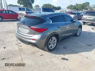 2017 Infiniti QX30 Sport with VIN SJKCH5CP9HA031424, listed as a IAAI auction lot 42792075 with 81,686 mi miles and . Bid and sale history available at DreamBid. Image 4.