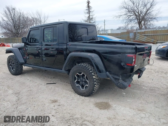 2022 Jeep Gladiator Rubicon with VIN 1C6JJTBG7NL145501, listed as a IAAI auction lot 41506842 with 20,593 mi miles and . Bid and sale history available at DreamBid. Image 3.