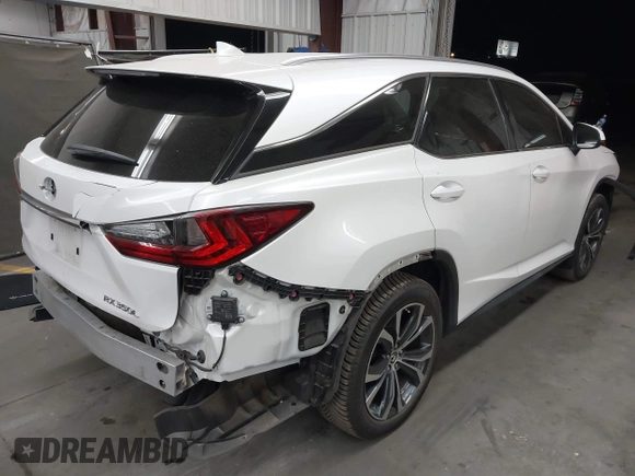 2018 Lexus RX 350L Premium z VIN JTJGZKCA3J2003885, wystawiony jako IAAI lot #42381977 z przebiegiem 76 823 mil mil oraz . Historia ofert i sprzedaży dostępna na DreamBid. Obrazek 4.