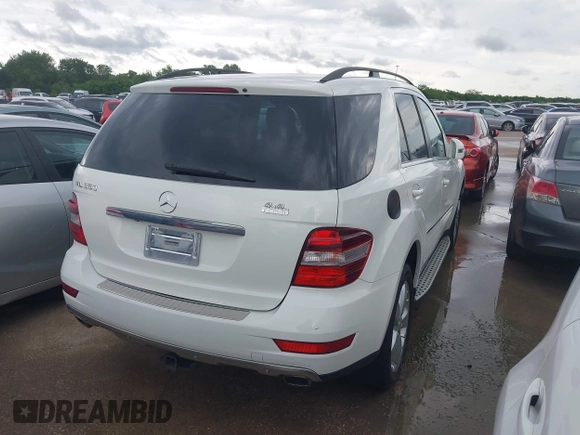 2011 Mercedes-Benz M 350 with VIN 4JGBB5GB5BA627082, listed as a IAAI auction lot 42036823 with 164,098 mi miles and . Bid and sale history available at DreamBid. Image 4.