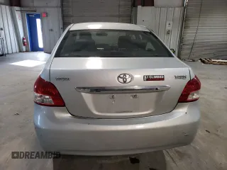2010 Toyota Yaris with VIN JTDBT4K3XA1382385, listed as a Copart auction lot 48544795 with 169,664 mi miles and Salvage Title. Bid and sale history available at DreamBid. Image 6.