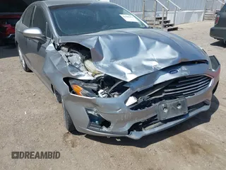 2020 Ford Fusion SE z VIN 3FA6P0HD9LR231471, wystawiony jako IAAI lot #41986473 z przebiegiem 58 587 mil mil oraz . Historia ofert i sprzedaży dostępna na DreamBid. Obrazek 6.