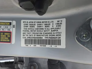 2010 Honda Insight LX with VIN JHMZE2H55AS039854, listed as a IAAI auction lot 42086147 with 153,555 mi miles and . Bid and sale history available at DreamBid. Image 9.