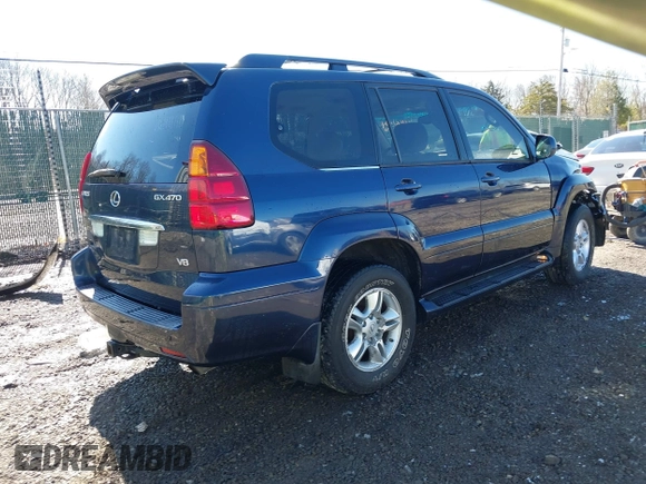 2005 Lexus GX with VIN JTJBT20XX50081621, listed as a IAAI auction lot 41661384 with 208,071 mi miles. Bid and sale history available at carsss.com. Image 4.