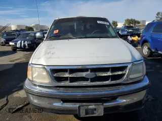 1997 Ford F-150 XL с VIN 1FTEX17L9VKB65855, выставлен на аукционе Copart как лот 87410414 с пробегом 198 005 миль миль и Списание • Salvage title. История ставок и продаж доступна на DreamBid. Изображение 5.