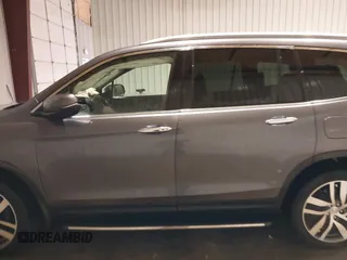 2017 Honda Pilot Touring with VIN 5FNYF6H91HB084737, listed as a IAAI auction lot 41608145 with 86,696 mi miles. Bid and sale history available at carsss.com. Image 14.