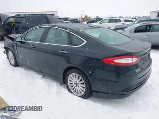 2016 Ford Fusion Energi SE Luxury with VIN 3FA6P0PU3GR166009, listed as a IAAI auction lot 41626623 with 133,596 mi miles. Bid and sale history available at carsss.com. Image 3.