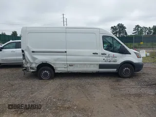2016 Ford Transit Cargo with VIN 1FTYR2CM2GKA13205, listed as a IAAI auction lot 42697411 with 112,854 mi miles and . Bid and sale history available at DreamBid. Image 13.