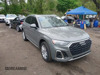 2023 Audi Q5 S line Premium z VIN WA1GAAFY2P2013050, wystawiony jako IAAI lot #42208300 z przebiegiem 22 218 mil mil oraz . Historia ofert i sprzedaży dostępna na DreamBid. Obrazek 1.
