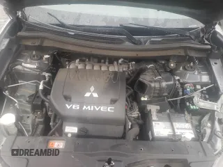 2014 Mitsubishi Outlander GT with VIN JA4JZ4AX2EZ009731, listed as a Copart auction lot 38760334 with 167,645 mi miles and Salvage title. Bid and sale history available at DreamBid. Image 12.