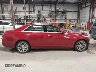 2016 Cadillac CTS Luxury Collection AWD z VIN 1G6AX5SX6G0124584, wystawiony jako IAAI lot #41235515 z przebiegiem 82 286 mil mil oraz . Historia ofert i sprzedaży dostępna na DreamBid. Obrazek 14.