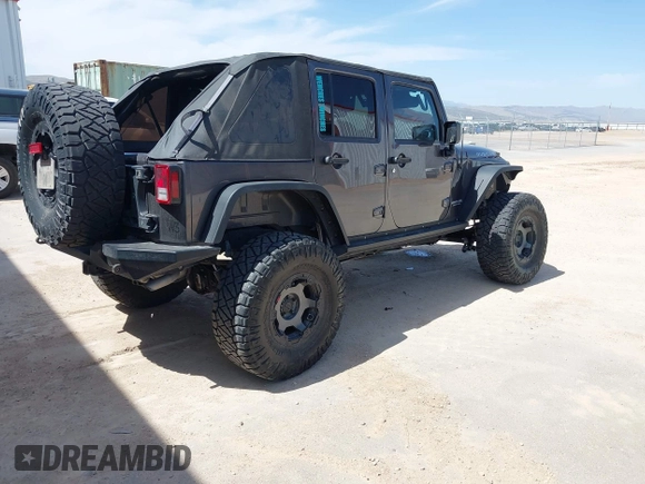 2014 Jeep Wrangler Unlimited Rubicon с VIN 1C4BJWFG2EL279938, выставлен на аукционе IAAI как лот 41920729 с пробегом 76 418 миль миль и . История ставок и продаж доступна на DreamBid. Изображение 4.
