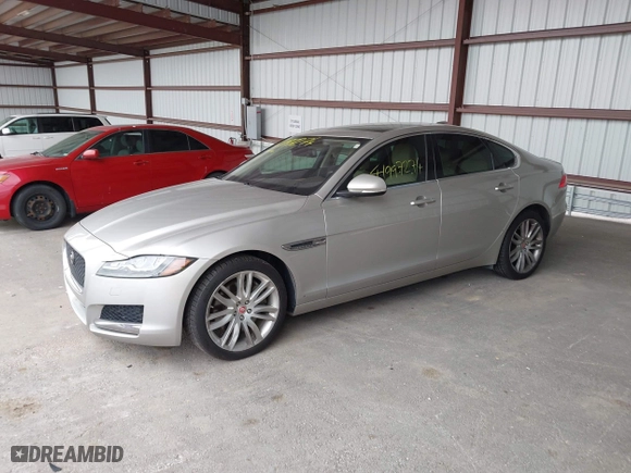 2016 Jaguar XF 35t Prestige with VIN SAJBE4BV2GCY16583, listed as a IAAI auction lot 41997274 with 81,186 mi miles. Bid and sale history available at carsss.com. Image 2.