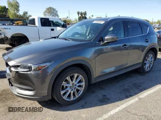 2019 Mazda CX-5 Grand Touring with VIN JM3KFADM2K0665356, listed as a Copart auction lot 51886685 with 44,760 mi miles and Salvage Title. Bid and sale history available at carsss.com. Image 1.