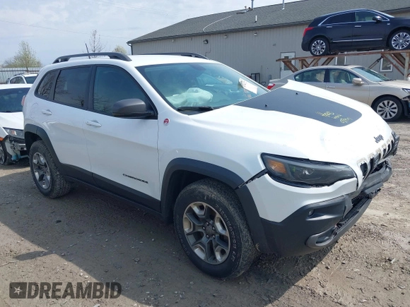 2019 Jeep Cherokee Trailhawk Elite with VIN 1C4PJMBX4KD351261, listed as a IAAI auction lot 41944727 with 97,849 mi miles. Bid and sale history available at carsss.com. Image 6.