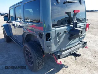 2015 Jeep Wrangler Unlimited Rubicon with VIN 1C4BJWFG7FL525724, listed as a IAAI auction lot 41394059 with 132,058 mi miles. Bid and sale history available at carsss.com. Image 6.