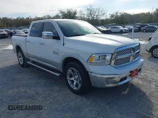 2017 Ram 1500 Laramie z VIN 1C6RR6NG9HS556255, wystawiony jako IAAI lot #41889626 z przebiegiem 90 141 mil mil oraz . Historia ofert i sprzedaży dostępna na DreamBid. Obrazek 1.
