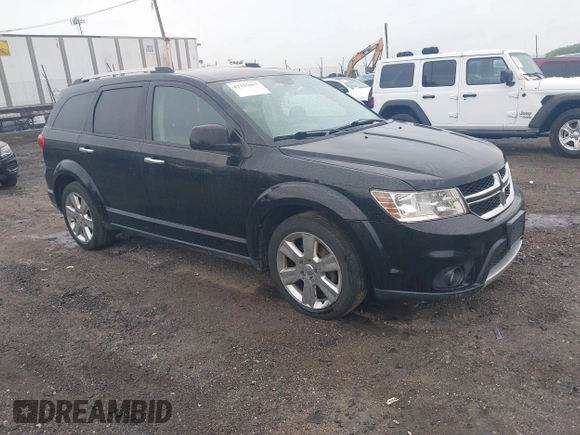 2014 Dodge Journey Limited with VIN 3C4PDDDG4ET141164, listed as a IAAI auction lot 42255057 with 195,135 mi miles and . Bid and sale history available at DreamBid. Image 1.