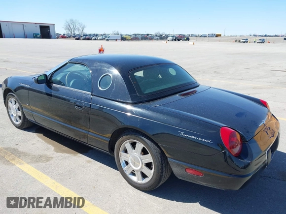 2004 Ford Thunderbird Deluxe z VIN 1FAHP60AX4Y103613, wystawiony jako IAAI lot #41962198 z przebiegiem 81 765 mil mil oraz . Historia ofert i sprzedaży dostępna na DreamBid. Obrazek 3.