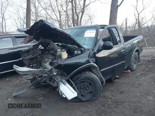 2003 Ford F-150 XL with VIN 1FTRX18L53NB62446, listed as a IAAI auction lot 41741524 with 1 mi miles. Bid and sale history available at carsss.com. Image 6.