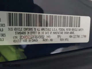 2015 Dodge Grand Caravan SXT Plus with VIN 2C4RDGCG7FR649032, listed as a IAAI auction lot 41825774 with 128,521 mi miles. Bid and sale history available at carsss.com. Image 9.