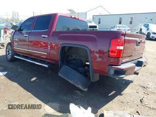 2014 GMC Sierra 1500 SLT with VIN 3GTU2VECXEG485827, listed as a IAAI auction lot 41976816 with 157,200 mi miles and . Bid and sale history available at DreamBid. Image 3.