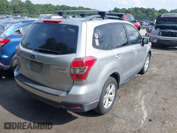 2014 Subaru Forester Premium with VIN JF2SJAGC0EH473208, listed as a IAAI auction lot 42800673 with 186,698 mi miles and . Bid and sale history available at DreamBid. Image 4.