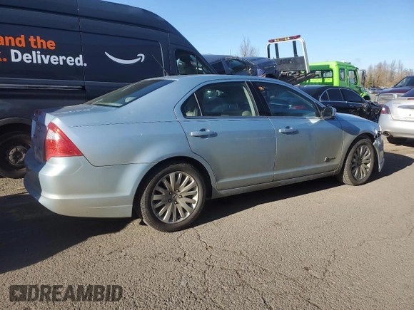 2010 Ford Fusion Hybrid with VIN 3FADP0L36AR288813, listed as a Copart auction lot 52039765 with 184,238 mi miles and Salvage title. Bid and sale history available at DreamBid. Image 3.