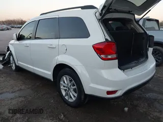 2018 Dodge Journey SXT with VIN 3C4PDCBG4JT514453, listed as a IAAI auction lot 41406727 with 121,235 mi miles. Bid and sale history available at carsss.com. Image 3.