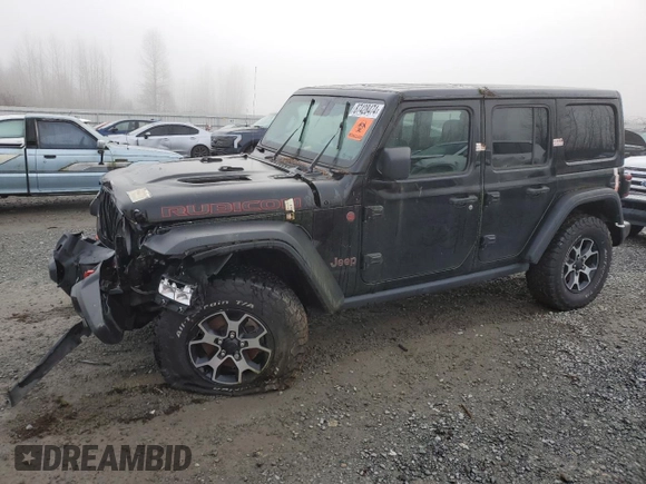 2021 Jeep Wrangler Unlimited Rubicon with VIN 1C4JJXFM7MW818199, listed as a Copart auction lot 87428474 with 18,696 mi miles and Salvage Title. Bid and sale history available at carsss.com. Image 1.