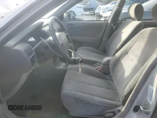 2002 Chevrolet Prizm z VIN 1Y1SK52842Z404089, wystawiony jako Copart lot #49103545 z przebiegiem 134 794 mil mil oraz Szkoda całkowita • Salvage title. Historia ofert i sprzedaży dostępna na DreamBid. Obrazek 7.
