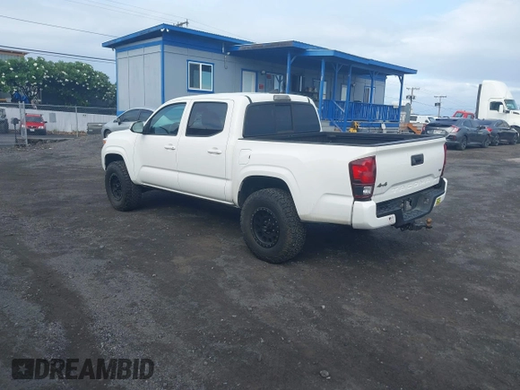 2023 Toyota Tacoma SR with VIN 3TYCZ5AN4PT168312, listed as a IAAI auction lot 42555775 with 8,288 mi miles and . Bid and sale history available at DreamBid. Image 3.