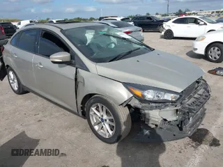 2015 Ford Focus SE with VIN 1FADP3F29FL292655, listed as a IAAI auction lot 41090945 with 106,060 mi miles. Bid and sale history available at carsss.com. Image 1.