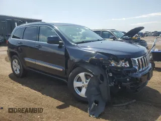 2011 Jeep Grand Cherokee Laredo with VIN 1J4RR4GG5BC703628, listed as a Copart auction lot 58626925 with 152,426 mi miles and Salvage title. Bid and sale history available at DreamBid. Image 4.