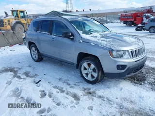 2015 Jeep Compass Sport with VIN 1C4NJDBB1FD206616, listed as a IAAI auction lot 41595052 with 112,836 mi miles. Bid and sale history available at carsss.com. Image 1.