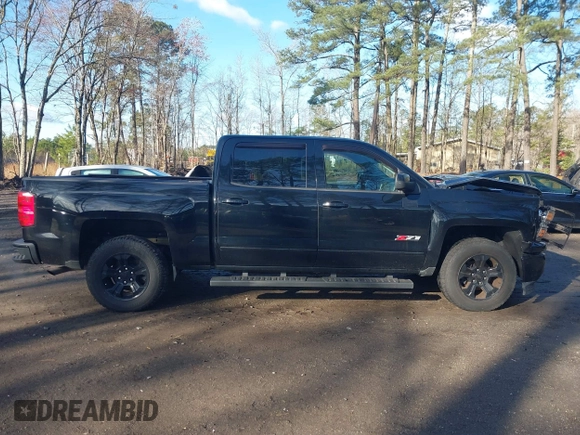 2015 Chevrolet Silverado 1500 LTZ with VIN 3GCUKSEC0FG497341, listed as a IAAI auction lot 41829608 with 96,805 mi miles. Bid and sale history available at carsss.com. Image 13.