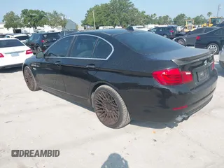 2012 BMW 5 Series 528i with VIN WBAXG5C58CDX05153, listed as a IAAI auction lot 42196906 with 120,652 mi miles. Bid and sale history available at carsss.com. Image 3.
