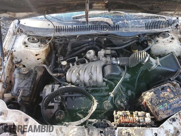 1997 Ford Taurus GL z VIN 1FALP52U1VG253340, wystawiony jako Copart lot #44081395 z przebiegiem 210 117 mil mil oraz Szkoda całkowita • Salvage title. Historia ofert i sprzedaży dostępna na DreamBid. Obrazek 11.