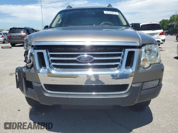 2007 Ford Explorer Sport Trac XLT z VIN 1FMEU51K87UA28537, wystawiony jako Copart lot #57344815 z przebiegiem 155 858 mil mil oraz Szkoda całkowita • Salvage title. Historia ofert i sprzedaży dostępna na DreamBid. Obrazek 5.
