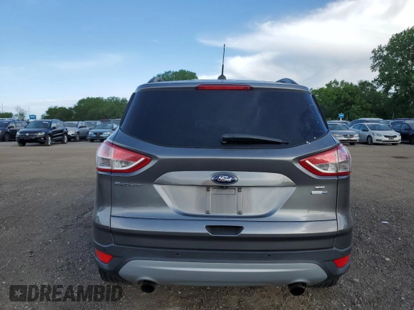 2014 Ford Escape SE z VIN 1FMCU9GX3EUE26446, wystawiony jako Copart lot #57113865 z przebiegiem 145 699 mil mil oraz Szkoda całkowita • Salvage title. Historia ofert i sprzedaży dostępna na DreamBid. Obrazek 6.