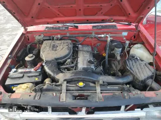 1994 Nissan Frontier with VIN 1N6SD11SXRC360680, listed as a Copart auction lot 84196824 with 105,338 mi miles and Salvage title. Bid and sale history available at DreamBid. Image 12.