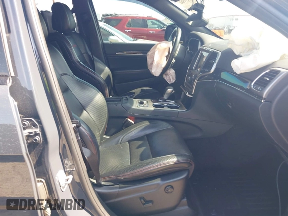 2018 Jeep Grand Cherokee Trailhawk with VIN 1C4RJFLT0JC316172, listed as a IAAI auction lot 42174162 with 81,891 mi miles and . Bid and sale history available at DreamBid. Image 5.