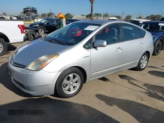 2007 Toyota Prius z VIN JTDKB20U477567380, wystawiony jako IAAI lot #42323632 z przebiegiem 193 349 mil mil oraz . Historia ofert i sprzedaży dostępna na DreamBid. Obrazek 2.
