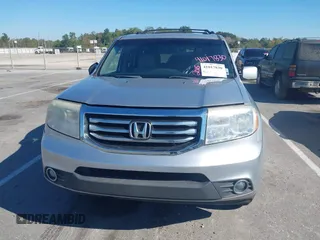 2015 Honda Pilot EX-L with VIN 5FNYF3H69FB001265, listed as a IAAI auction lot 41017830 with 188,572 mi miles and . Bid and sale history available at carsss.com. Image 12.