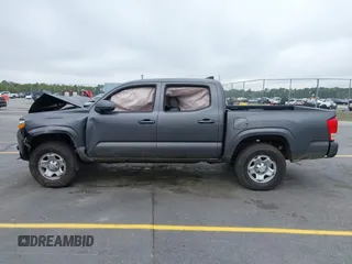 2017 Toyota Tacoma SR z VIN 5TFAX5GN7HX090832, wystawiony jako IAAI lot #41903374 z przebiegiem 234 499 mil mil oraz . Historia ofert i sprzedaży dostępna na DreamBid. Obrazek 14.