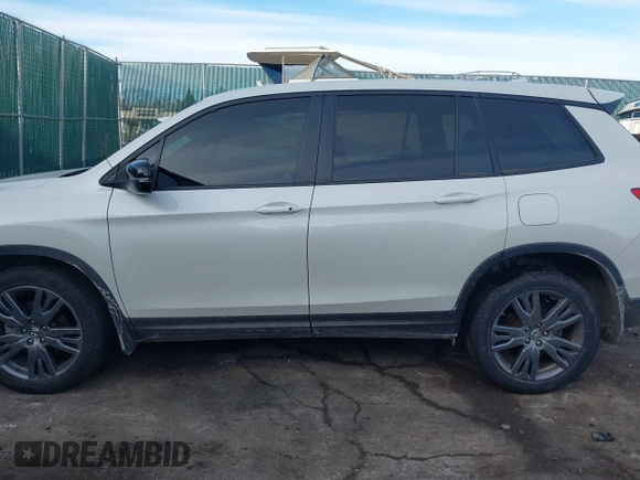2019 Honda Passport EX-L with VIN 5FNYF8H5XKB008904, listed as a IAAI auction lot 41440706 with 57,317 mi miles and . Bid and sale history available at DreamBid. Image 14.