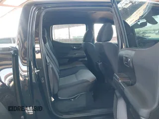 2021 Toyota Tacoma SR5 with VIN 5TFAZ5CN1MX111605, listed as a IAAI auction lot 42465381 with 67,307 mi miles and . Bid and sale history available at DreamBid. Image 8.
