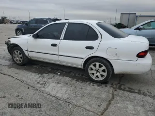 1996 Geo Prizm z VIN 1Y1SK5263TZ061291, wystawiony jako Copart lot #85366554 z przebiegiem 211 051 mil mil oraz Szkody całkowita. Historia ofert i sprzedaży dostępna na DreamBid. Obrazek 2.
