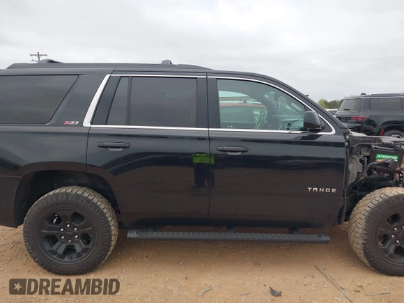 2017 Chevrolet Tahoe LT with VIN 1GNSKBKCXHR388181, listed as a IAAI auction lot 41936609 with 94,783 mi miles and . Bid and sale history available at DreamBid. Image 14.
